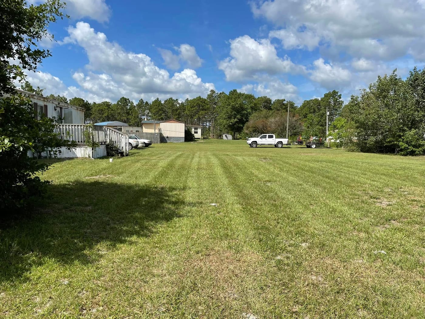 Fresh mulch and landscaped beds by On Edge Lawn Care