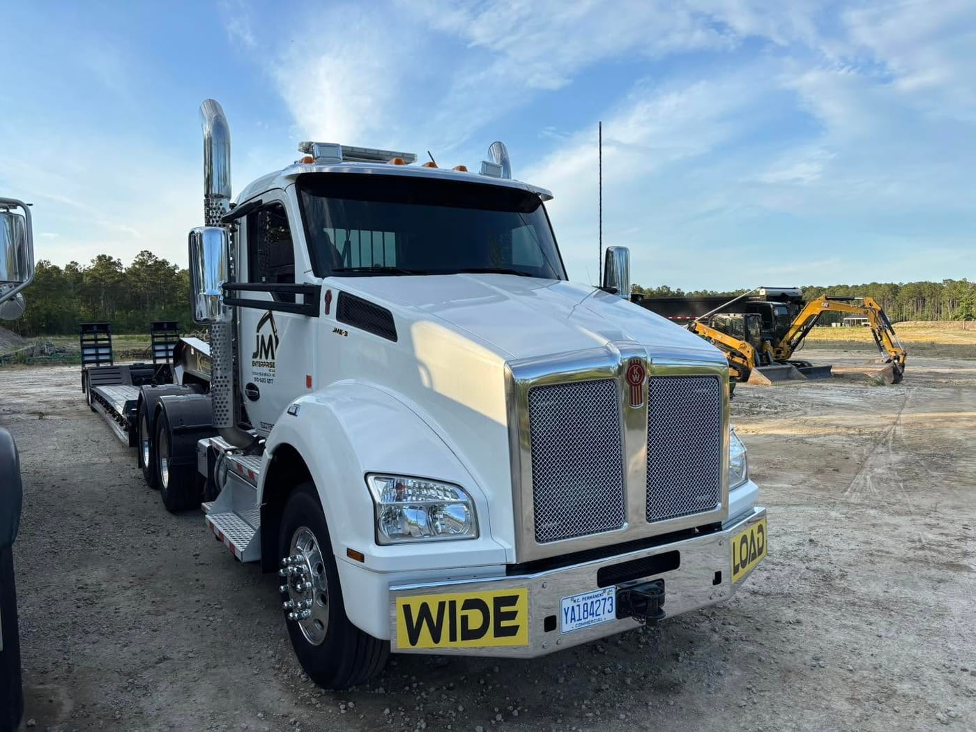 On Edge Lawn Care dump truck hauling for a cleanup job