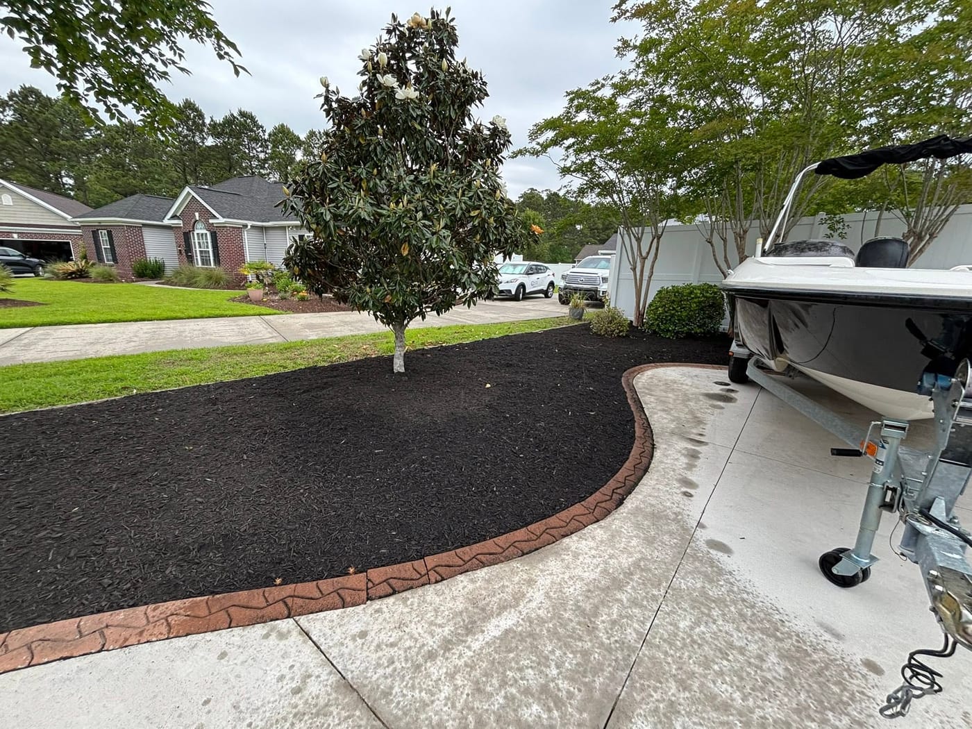 Manicured lawn and trimmed shrubs at a Brunswick County home