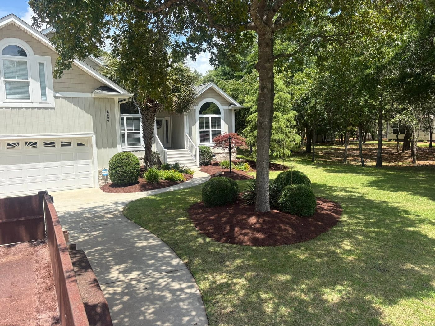 Clean edges and refreshed beds by On Edge Lawn Care