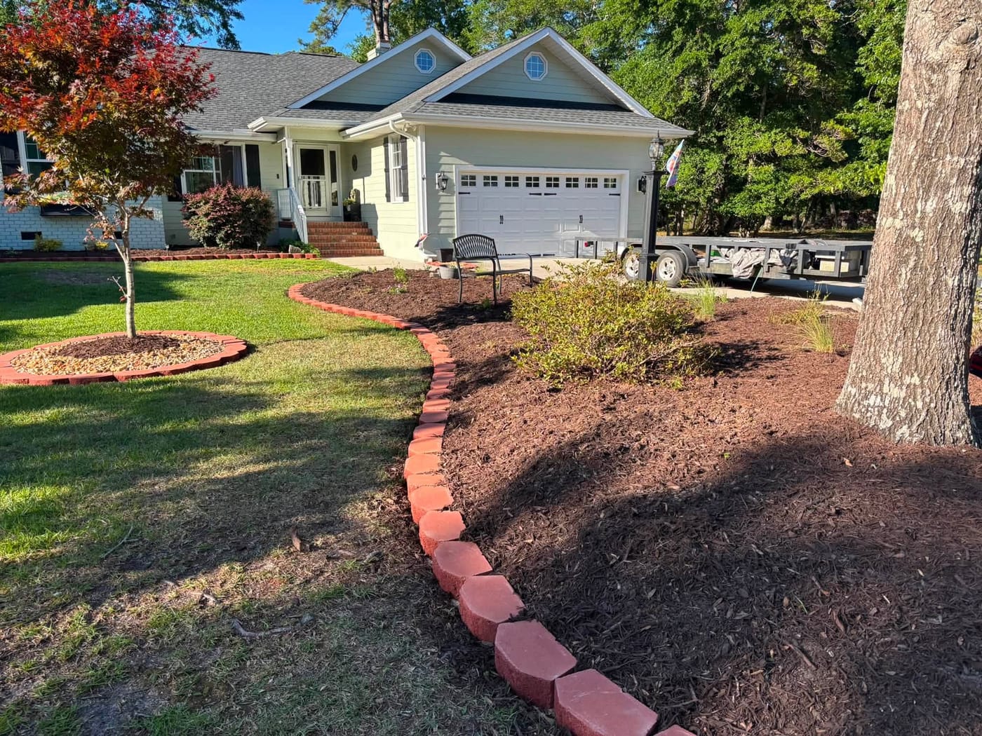 Fresh mulch beds and clean landscaping at a coastal Brunswick County home