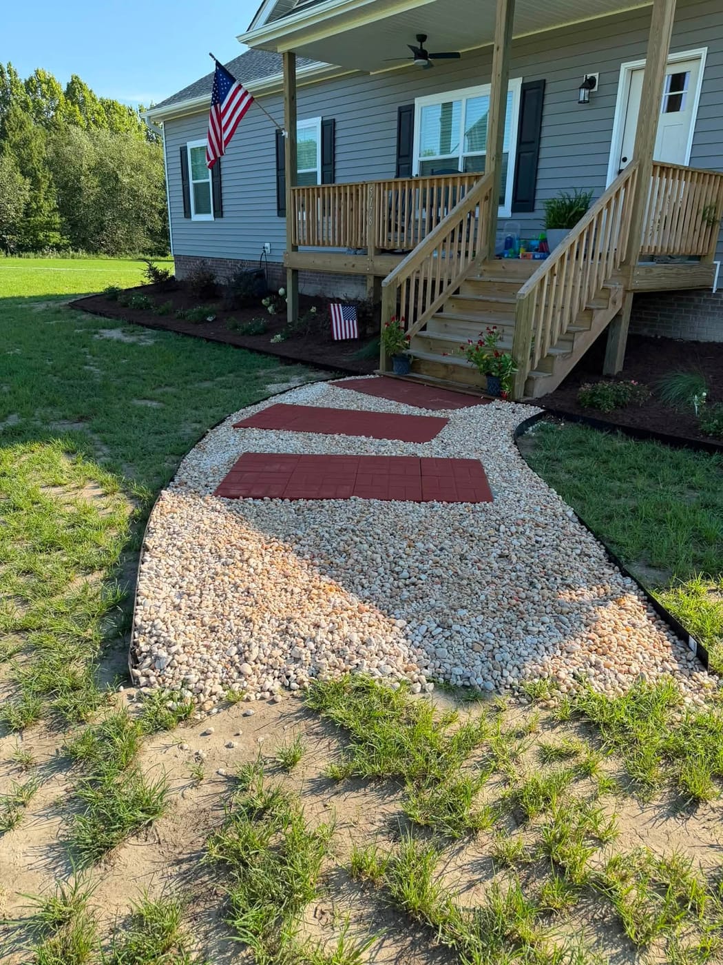 Fresh mulch and landscaped beds by On Edge Lawn Care