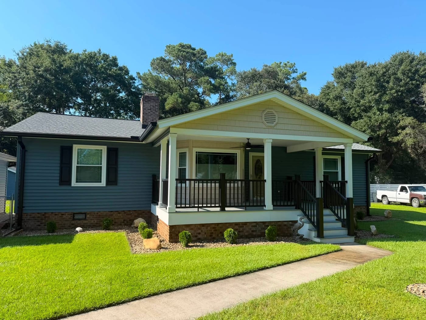 Fresh mulch and landscaped beds by On Edge Lawn Care